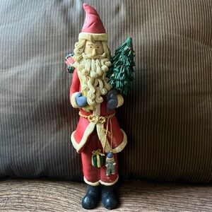 Vintage Christmas Classic Santa Claus carrying a Baby doll